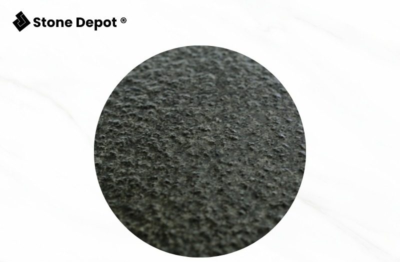 black-lava-stone-bush-hammered-wet